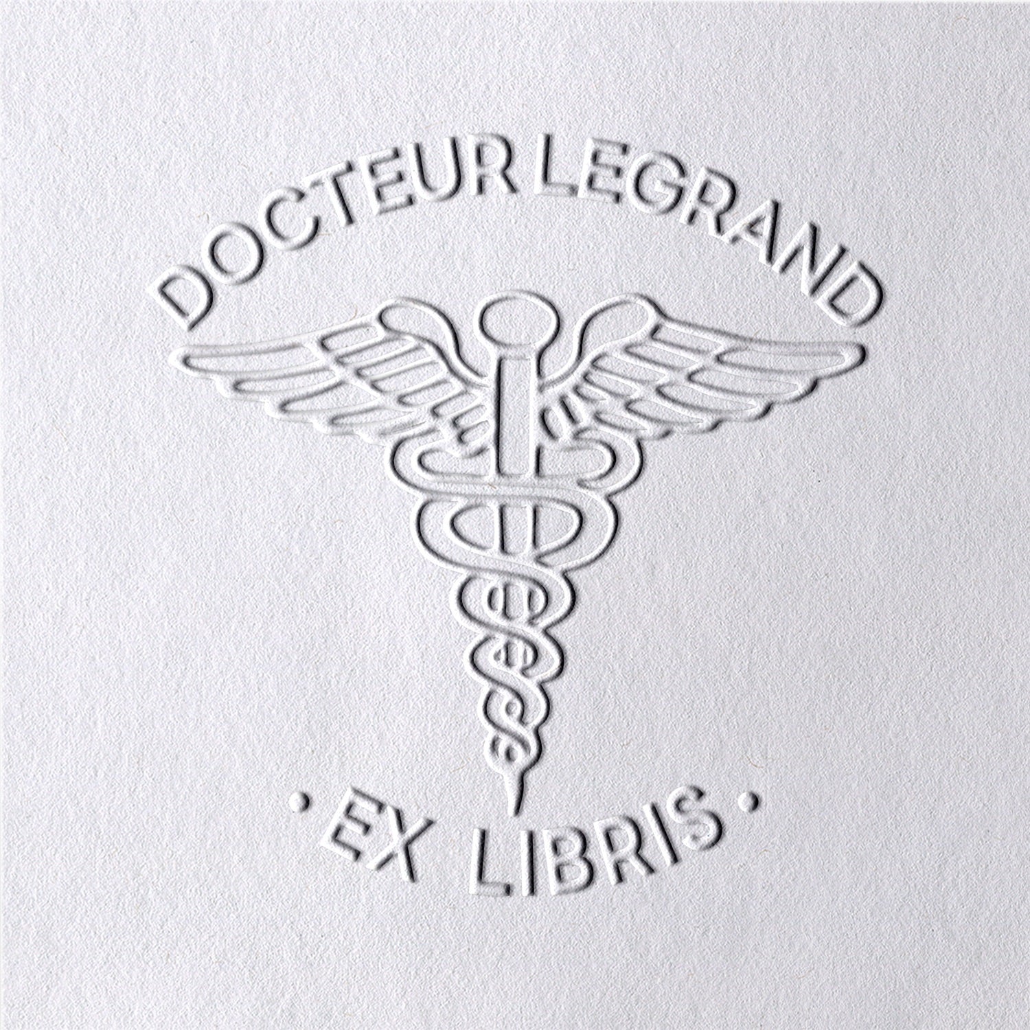 Sello en Seco Personalizado de Caduceo Ex Libris para Libros2